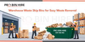 Warehouse workers loading cardboard and timber waste into a Pro Bin Hire skip bin